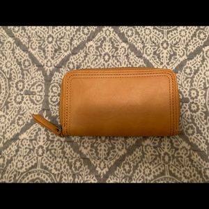 Gently used tan zip around wallet
